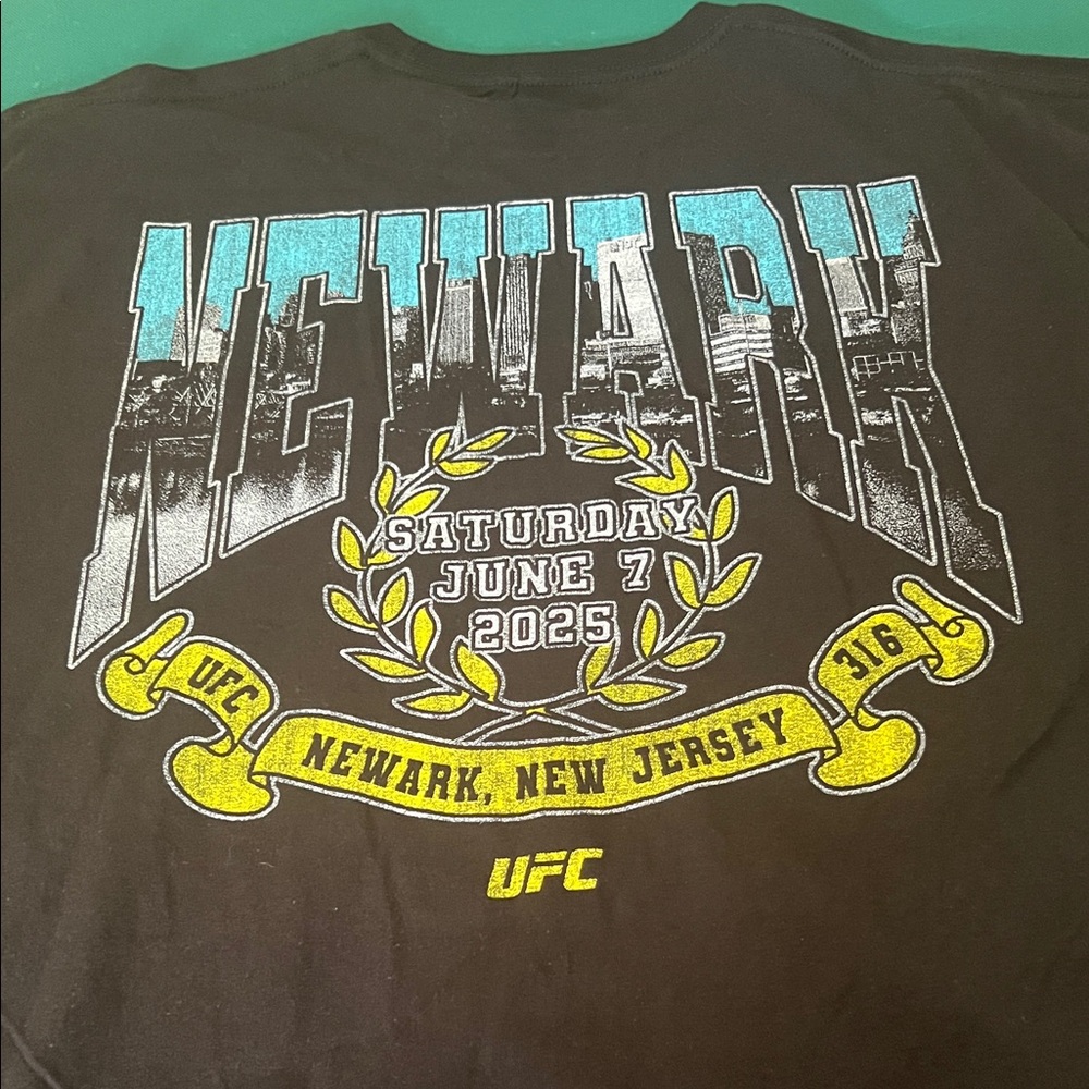 UFC Black Tee with Teal and Yellow Newark Graphic NWOT - Picture 1 of 3
